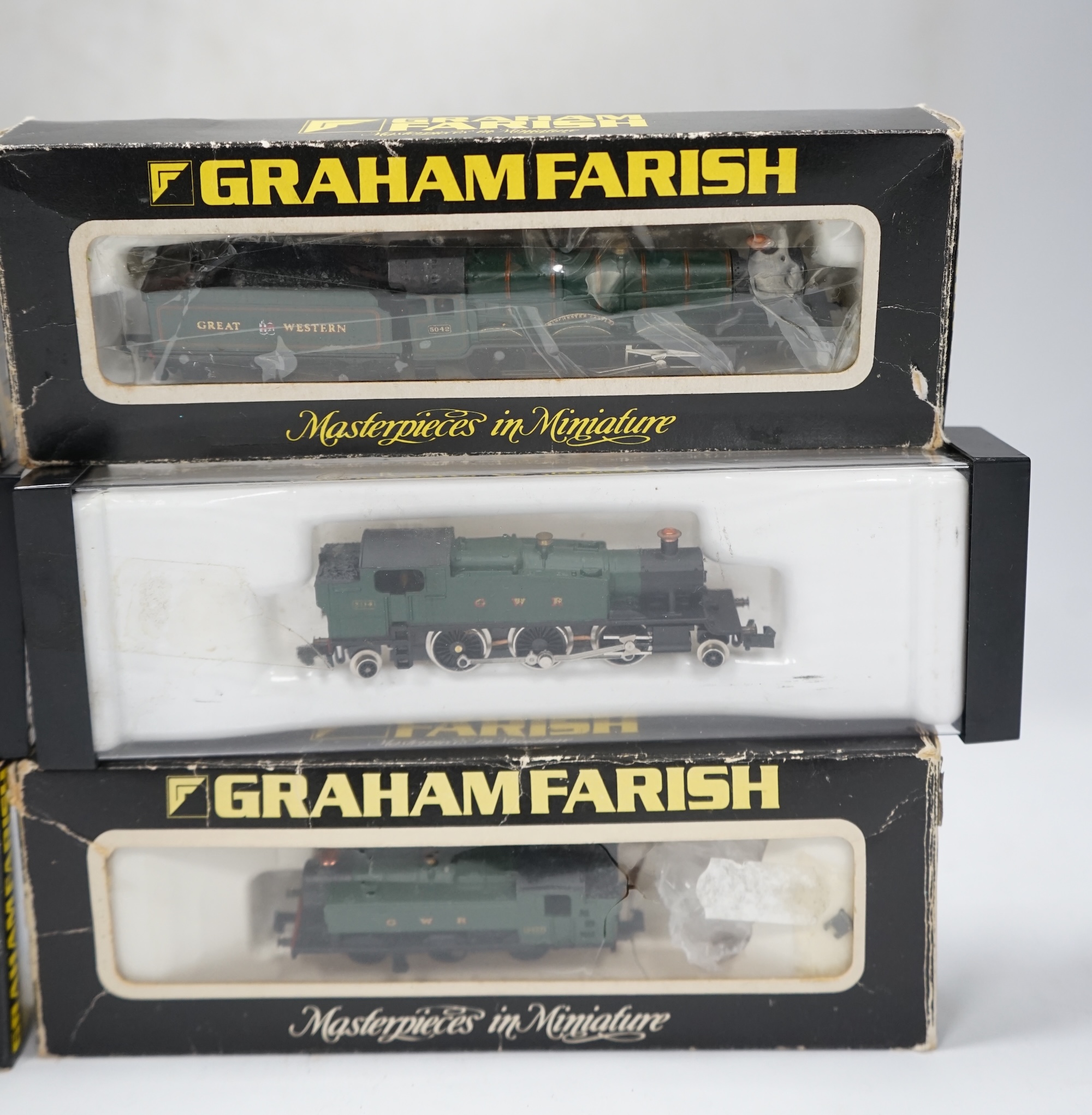 Six boxed Graham Farish N gauge locomotives; a GWR Castle Class, a GWR Prairie Tank, a GWR Pannier Tank, two LMS 0-6-0Ts, and a BR Class 5MT ‘Crab’. Condition - good, some wear to boxes and some locomotives in incorrect